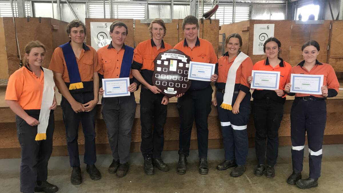 Winning WA College of Agriculture, Denmark, year 11 and 10 students (left to right): Tia McGuffie, Josh Coole, Hamish Bowie, Davin Jarvis, Hamish Mostert, Hayley Albury, Lilly Driscoll and Emma Baragwanath. They were presented with the trophy by Australian Wool Innovations Ellie Bigwood.