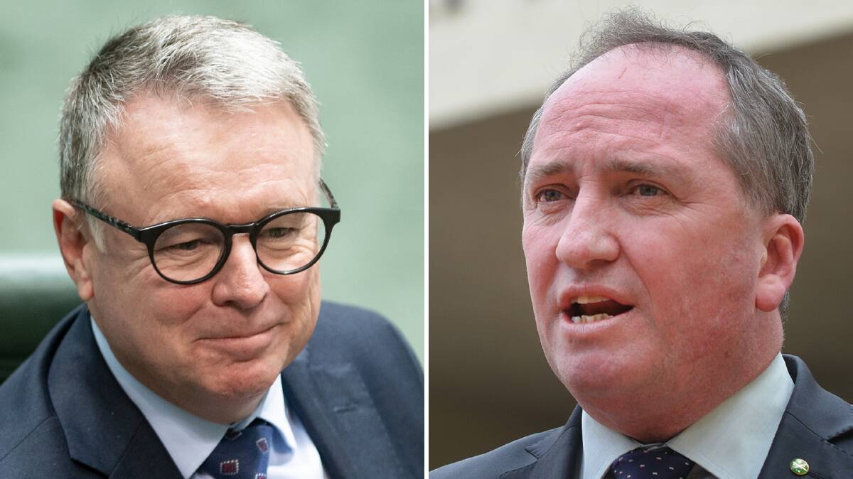 HALLWAY CLASH: Joel Fitzgibbon and Barnaby Joyce had an impromptu debate in the parliament halls. 