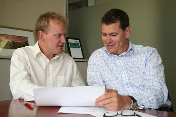 Plum Grove senior pool manager and trader Tony Smith (left) and Plum Grove managing director Andrew Young go over plans which will see the direct marketing of WA Noodle wheat into Japan and Korea through a new Plum Grove harvest pool.