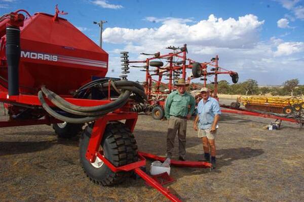 Landmark auctioneer Grant Lupton (left) and Charlie Wroth, Toodyay with the two units Charlie purchased for a total of $30,500 at the on-property Grosskopf family clearing sale at Yerecoin last week.