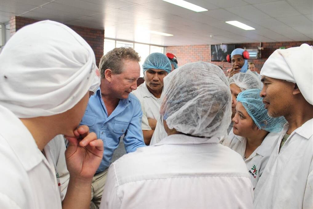 Andrew Forrest huddles in with Harvey Beef staff at his visit of the plant last Friday.