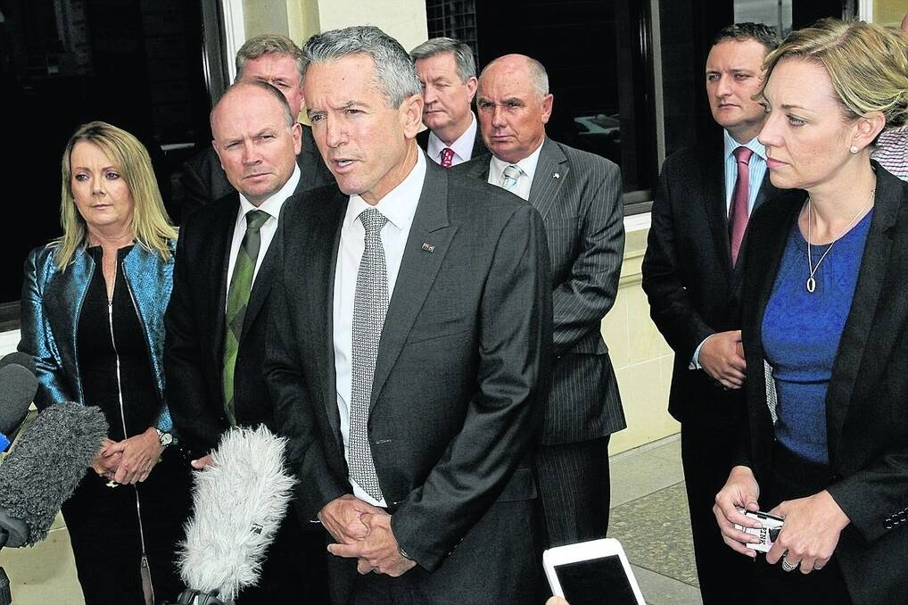 p Nationals WA leader Terry Redman is flanked by fellow National MPs during his announcement his party would not support the Liberal Government&#39;s moves to sell the Fremantle Port.