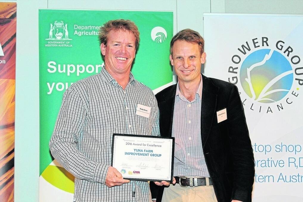 Yuna Farm Improvement Group chairman Brady Green (left), with Grain Industry Association of WA chairman Richard Williams. YFIG last week received the inaugurall Grower Group Alliance (GGA) award for excellence at the GGA conference in Perth.