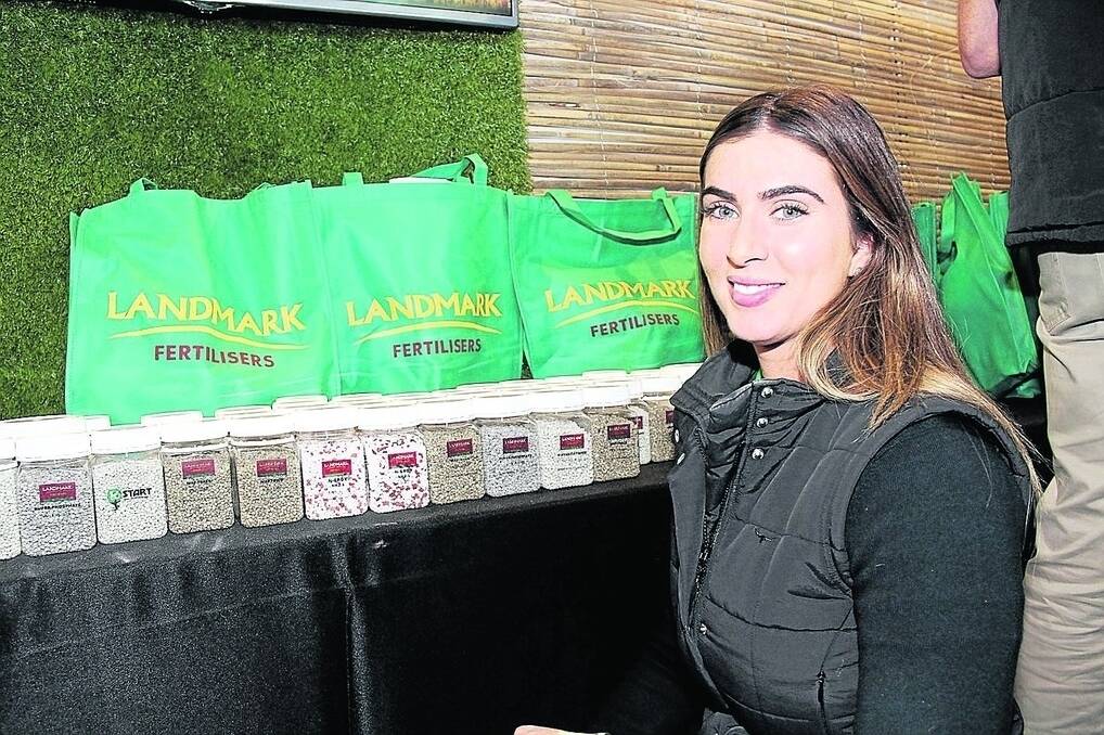 Landmark Fertilisers sales and operations manager Natalie Adams with some of the Landmark Fertilisers range that was launched in Dowerin last week.