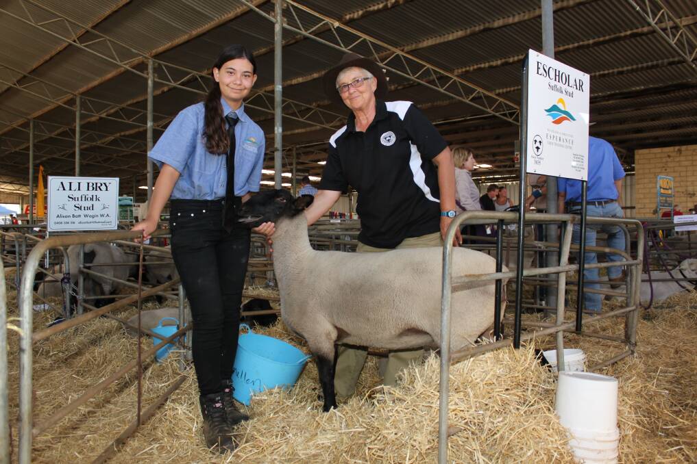 Esperance Farm Training Centre student, Lilly Brooks (15) with Pam Hinkley, Pamellen Suffolk stud, Clackline, and a ewe Pam donated to the Esperance Farm Training Centre to establish the Escholar Suffolk stud.
