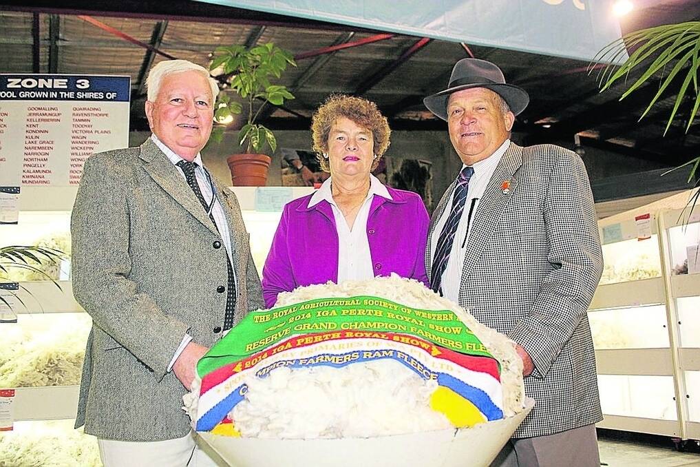 Ted (right) and Bev Hill, Ravensthorpe, with Ken Walker, councillor in charge of the Perth Royal Show wool section, at the 2014 show. This year will be the Hills&#39; 23rd consecutive year entering the fleece competition.