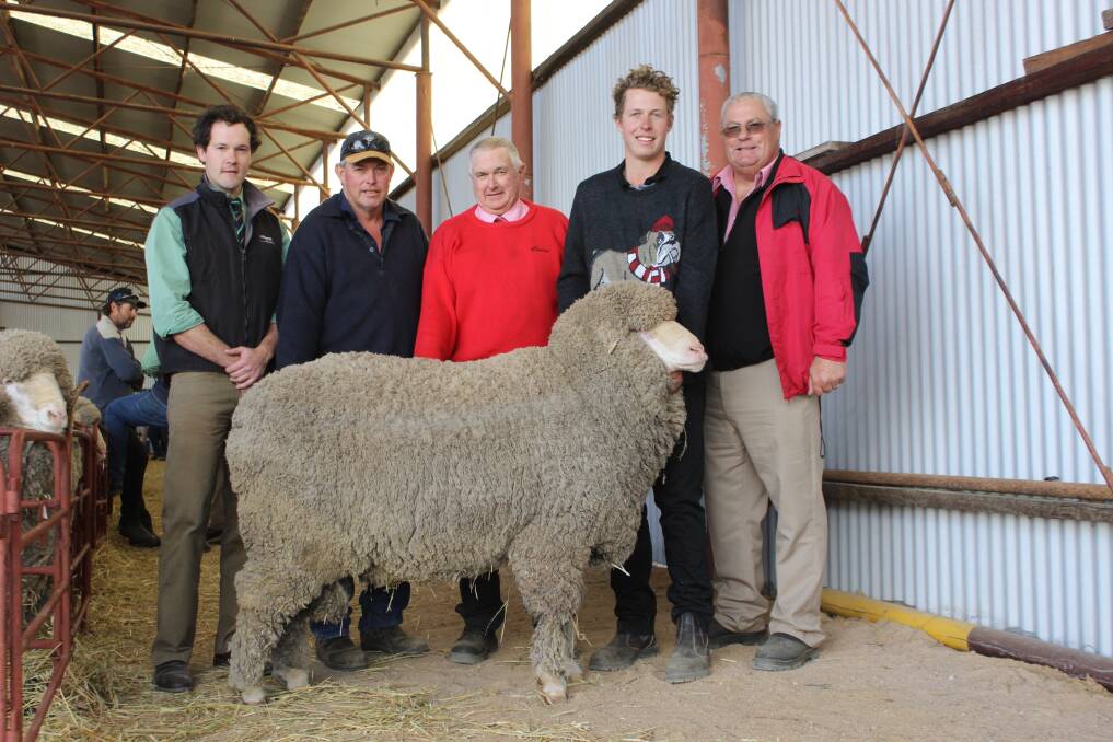 Michael Altus (left), Kamballie principal Shayne Mackin, Tammin, Elders district wool manager Russell Wood, who purchased the ram for the Tilbrooks, Curtis Mackin and Elders stud stock representative Kevin Broad.
