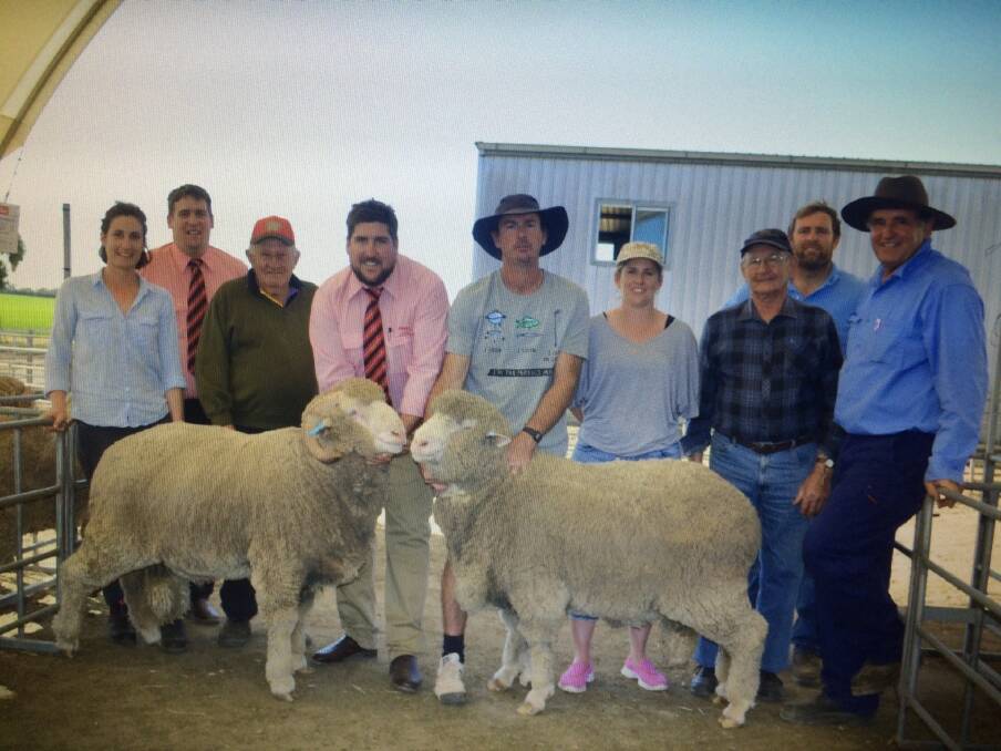 Crichton Vale stud co-principal Gabby Cowan (left), Colin Ogilvie, Elders Narembeen, $2550 top price Merino buyer Ron Butler, Narembeen, Elders auctioneer Jarrad Hubbard and the $3050 top-priced Poll Merino ram buyers Andrew, Samantha and John Greay, JR & DR Greay & Co, Kondinin, with Crichton Vale connection Pete Cowan and stud principal Bill Cowan.