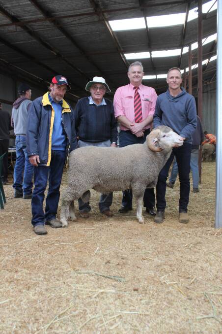 With the $3000 top-priced ram at last week's Eastville Merino and Poll Merino on-property ram sale at Wickepin were buyers Ian (left) and Glen Garard, Hyden, Elders State Livestock manager Geoff Shipp and Eastville co-principal Brett Doncon.