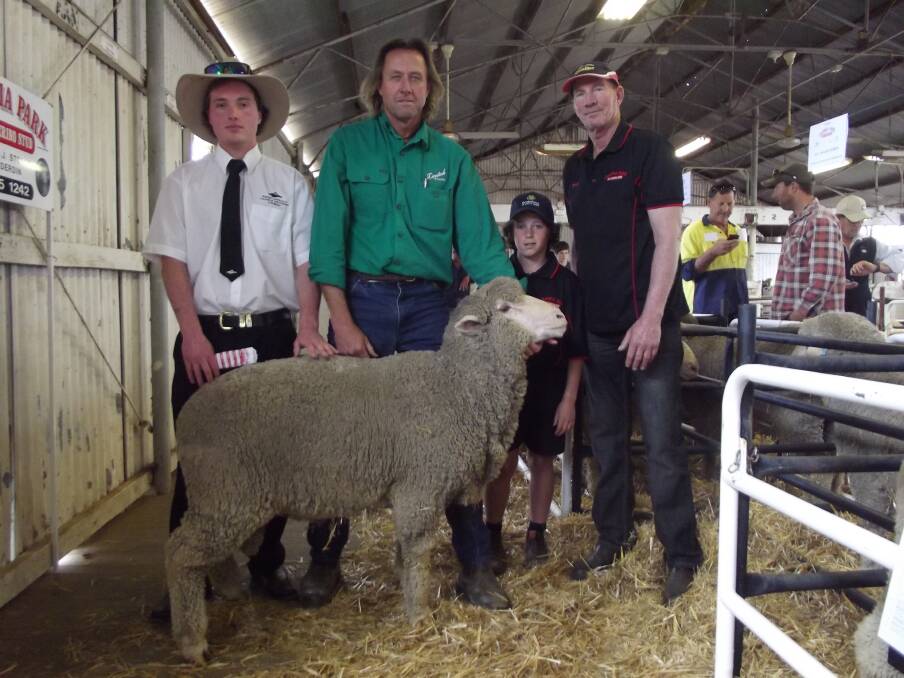 The top-priced ram at the Triple C sale was a Cadonia Park Poll Merino, shown with Cunderdin student and "apprentice"auctioneer Travis Flack (left), Rex Luers, Landmark Kellerberrin/Cunderdin, Jed Hill, CS & SM Hill, Cunderdin and vendor Bruce Storer.