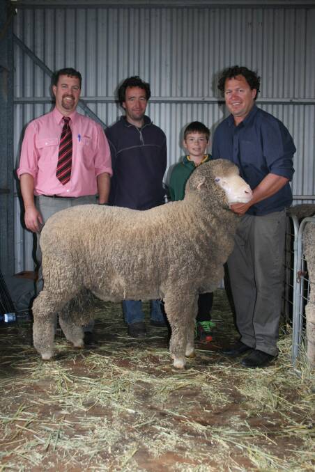 Elders auctioneer Nathan King (left), with top-price buyer Lindsay Johnson, EP Johnson & Co, Wagin, Thomas Bolt and Claypans stud co-principal Steven Bolt with the ram Mr Johnson purchased for the $2400 top price at last week's Claypans on-property ram sale at Bilbarin.