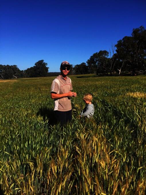 Williams grower Lewis Johnstone with 4 yearl-old son Callum. Mr Johnstone, along with eight other particpants, graduated from the GrainGrowers Australian Grain Farm Leaders program last month.