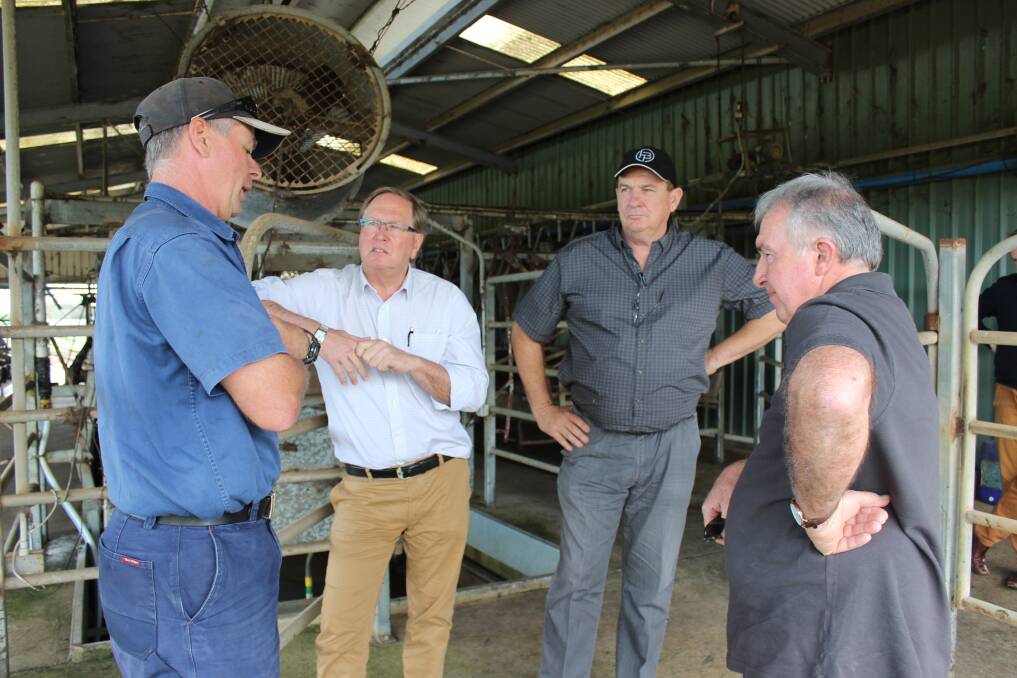 Former Harvey dairy farmer Dale Hanks (left) and Graham Manning (right), with Mark Lewis and Murray Cowper.
