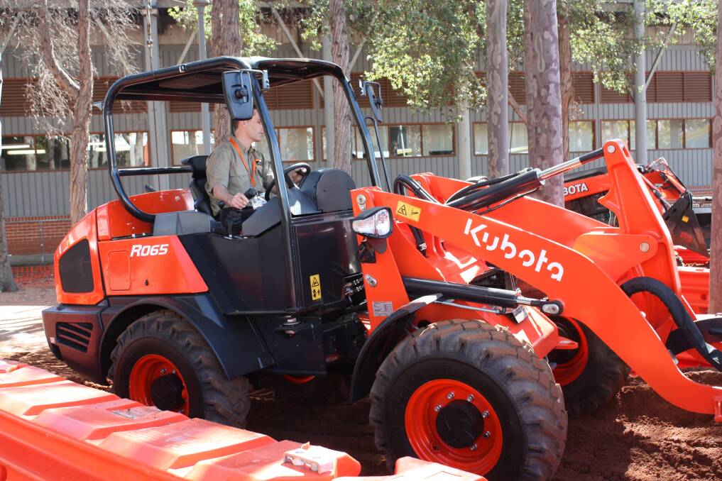 The Kubota R065 in action.