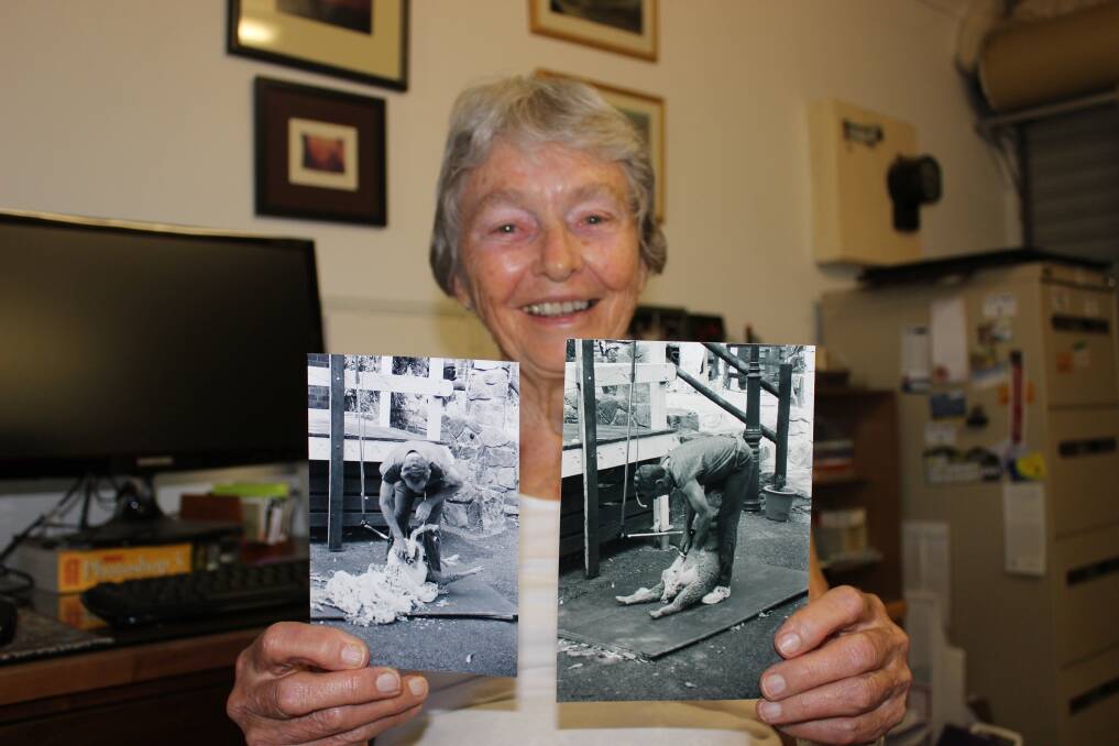 Author and shearing historian Valerie Hobson displays two photographs of her friend, shearer and shearing instructor Graeme Tyers who will be inducted posthumously into the Australian Shearers Hall of Fame next Easter.