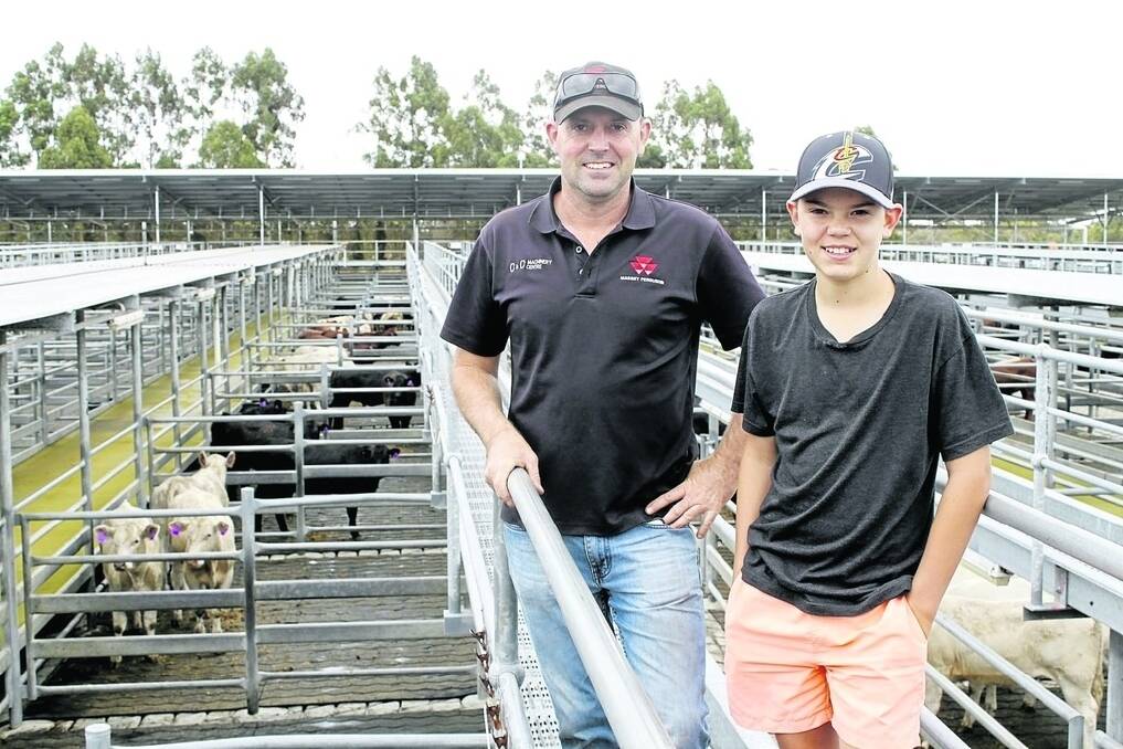 Matt Pearce (left) and his son Riley (12), C&C Machinery Centre, Albany, had a quick look at the cattle on display before manning their exhibit at Saturday's Harvey Beef Gate 2 Plate Challenge open day.