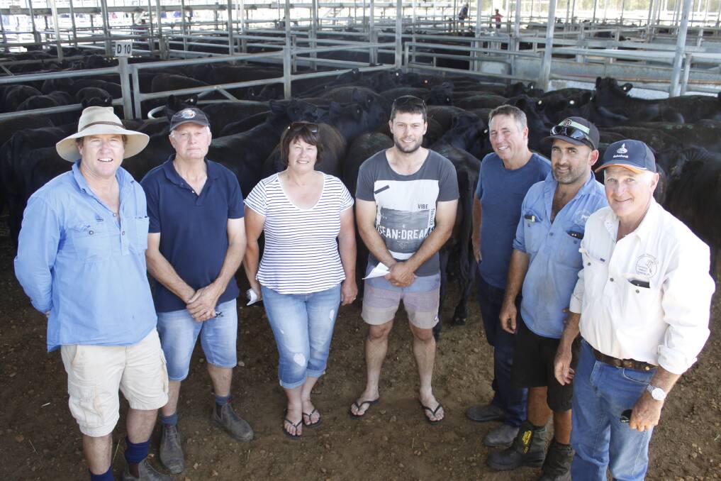 Coonamble Angus stud's Craig Davis (left), Bremer Bay, vendors Noel, Karen and Luke Bairstow, Arizona Farms, Lake Grace, Landmark Lake Grace livestock agent Garry Prater and buyers Kim and Brian Lester, Jarraluka Feedlot, Manypeaks. The group stands with some of the seven lots of Coonamble blood steers put up for auction by the Bairstow family that were purchased by the Lesters.