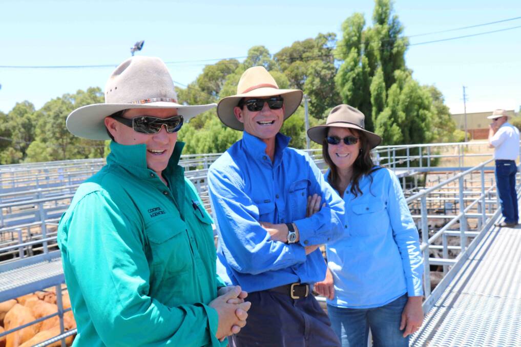 Landmark Bridgetown agent Ben Cooper (left) with clients Ric and Alison Wheatley, Bridgetown. The Wheatleys sold several pens of calves in the sale to $1230.