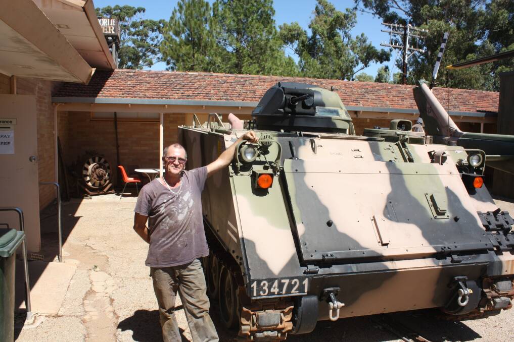 Dave, the restorer, pictured in front of the Armoured Personnel Carrier at the Merredin Military Museum. Dave used to drive such a vehicle during his time in the Australian Army and now enjoys his retirement tinkering with old military vehicles to restore them to their former glory.