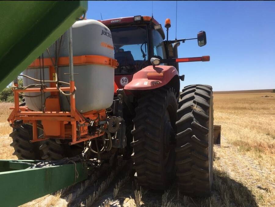 The winning #harvesthacl entry from Jim Heal - rigging up a spray tank between the tractor and chaser bin to keep the chaser bin driver busy and the weeds at bay.