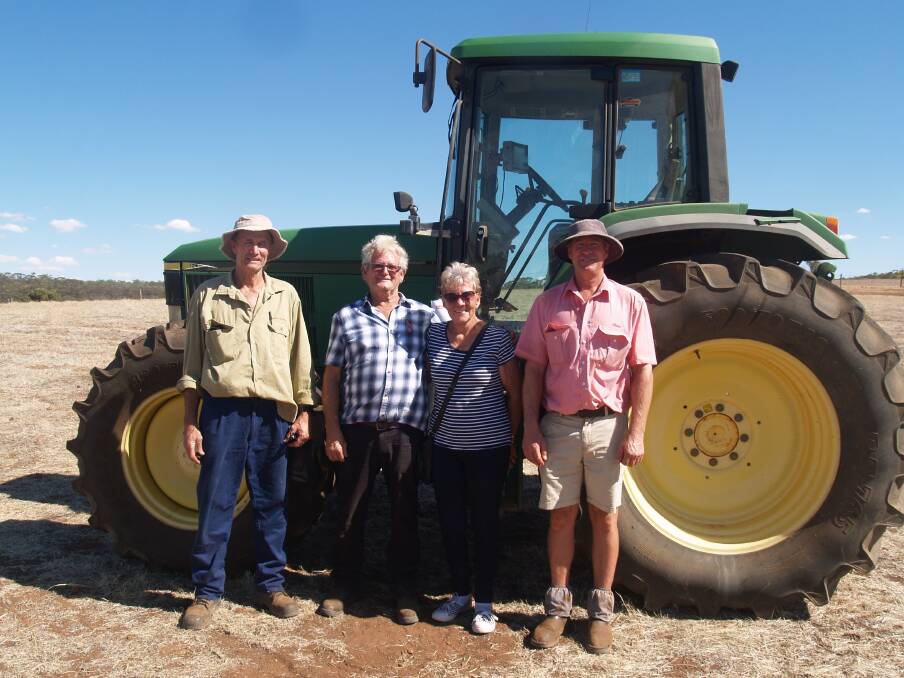 The sale's top price  was $41,000 paid for this John Deere 6810 tractor. Vendor Maurice Sewell (left) is with the buyers, Brenton and Cora Ewen, Derby and Porongurup and Elders local agent Jeff Brown, who put the sale together.