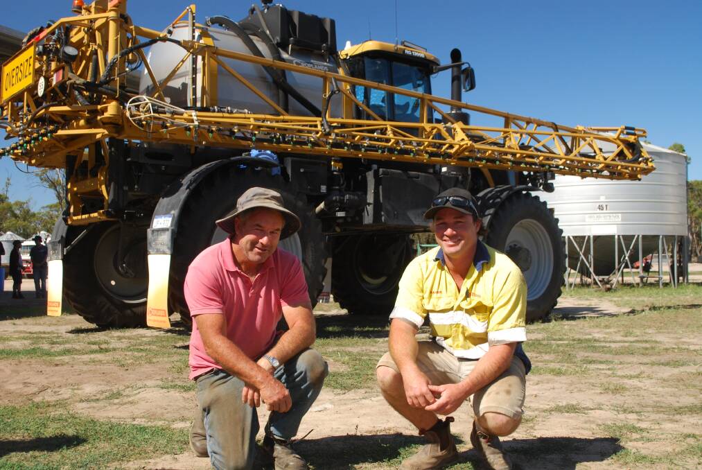 Ken (left) and Darren Hunt, Woogenellup, bid to $400,000 to buy this Croplands RoGator self-propelled boomsprayer at Ron and Erica Russell's clearing sale at Jerramungup last week. Most major items failed to meet vendor reserves but the Hunts couldn't resist the low-hour sprayer.