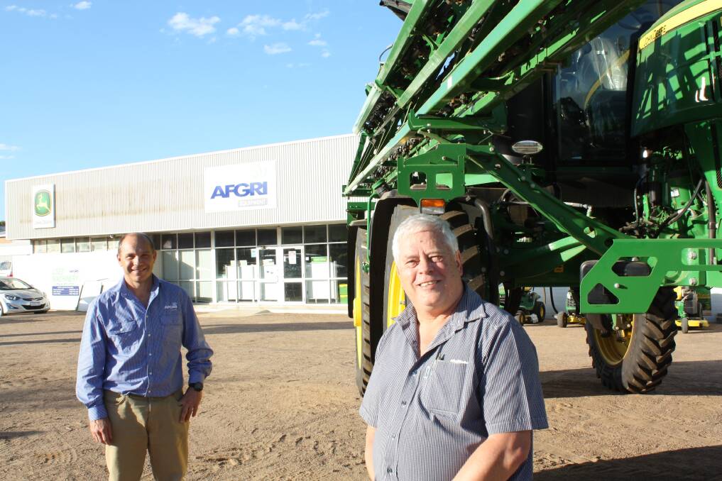 AFGRI Equipment commercial director Wessel Oosthuizen (left) and operations manager Gollie Coetzee outside the new AFGRI Equipment Esperance branch. The pair have been at the forefront of an 18 month growth strategy that last week culminated in the official acquisition of Esperance John Deere dealership Ratten & Slater. It makes AFGRI the world's largest John Deere dealership with 45 branches in A