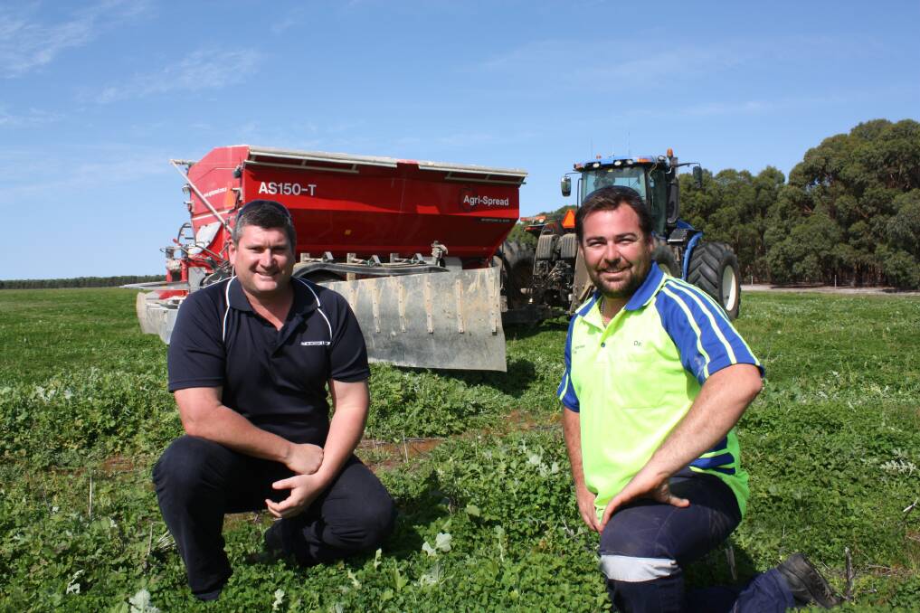 McIntosh &Son Esperance salesman Michael Fethers (left) and farm operations manager Daffyd 'Daf' Jones discuss the performance of the Agrispread during a short re-filling break.
