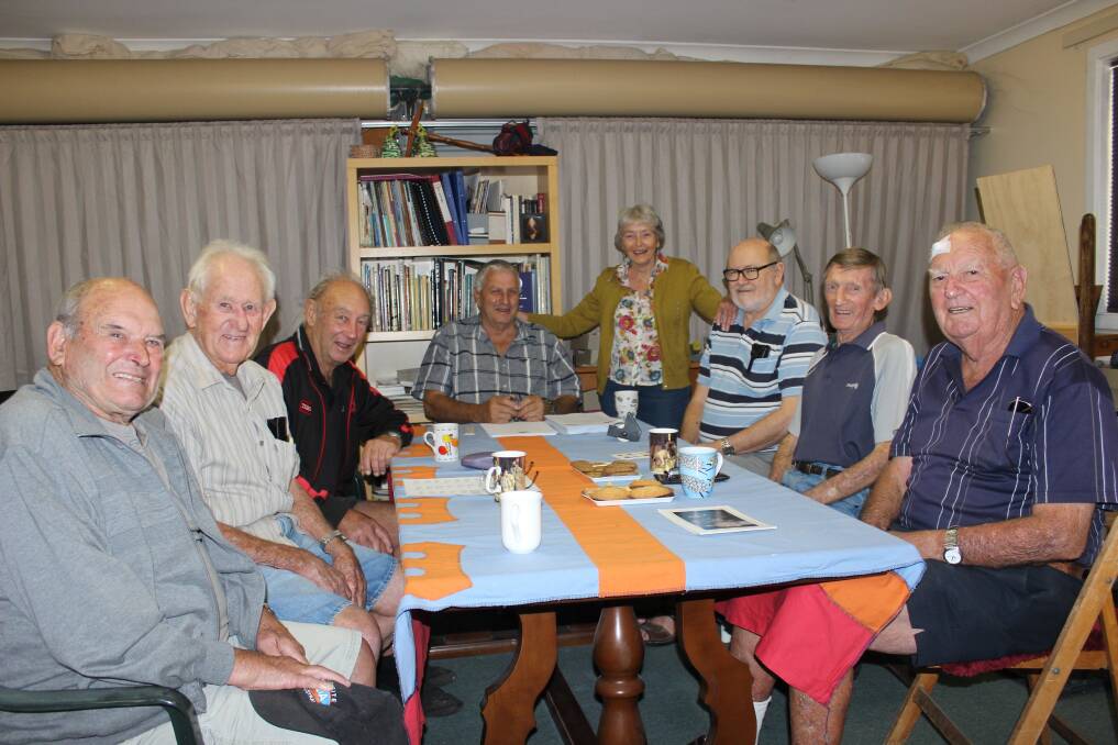 Members of the Shearers & Pastoral Workers Social Club, John Moore (left), Kevin Plunkett, Ray Gibletts, Mick Ropeson, secretary Val Hobson, Jim Clune, Jimmy Woods and Gil Barr gathered for a 'lickin' and stickin' day".