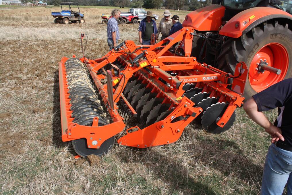 A close-up of the Kubota CD disc harrow with the distinctive rear Actipack rollers which are designed for clod crushing and firming soil, leaving an impression in the soil similar to a press wheel. This aids volunteer regrowth and the rollers can be adapted for heavy and sticky soils and a range of optional rollers are available. 
