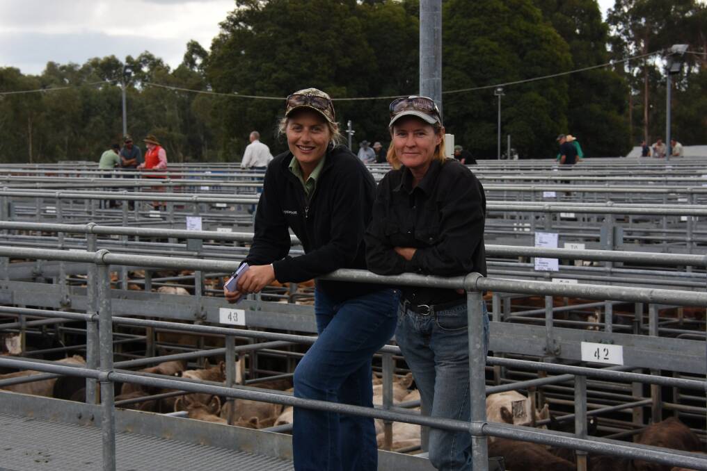  Landmark Brunswick representative Lyndsay Flemming (left) and vendor Robyn Allingham, P & R Allingham, Cookernup. The Allinghams offered a pen of Murray Grey steers and a pen of heifers which sold for $1235 and $1105.