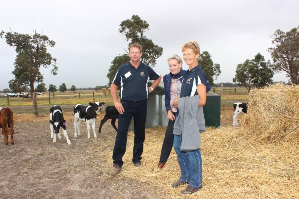 Agriculture and Food Minister Alannah MacTiernan (centre) in the calf paddock with last week's Dairy Innovation Day hosts Robin and Betty Lammie, Busselton. Ms MacTiernan spent about seven hours learning more about dairy at the day, in meetings with dumped milk suppliers and at an industry dinner.