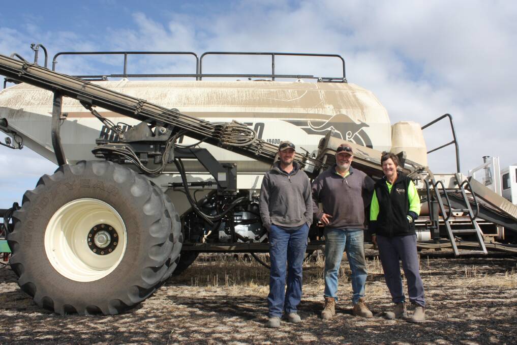 Clint (left) and Lawry Pitman and employee Sue Gallinagh had almost finished sowing their barley program in Corrigin last week.