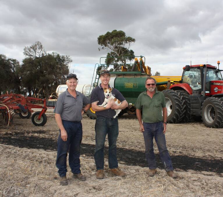 Richard Smith (left), Adam Smith and employee Greg Moulten are over halfway through their seeding program in Beverley.