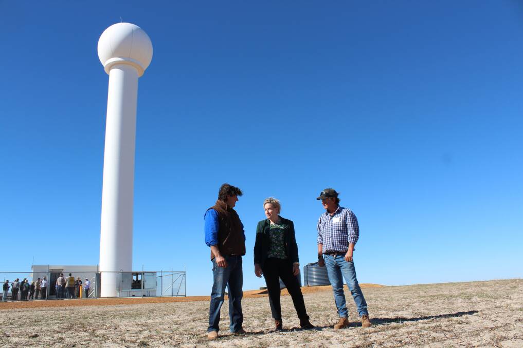 Giles Keamy (left), with Agriculture and Food Minister Alannah MacTiernan and his brother Alex Keamy. The new Doppler radar weather station has been built on the Keamy farm at Watheroo.