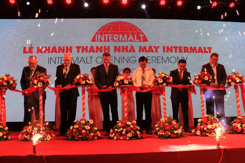 Interflour Group chairman Imre Mencshelyi (left), CBH Group chairman Wally Newman, Interflour Group chief executive and managing director Greg Harvey, People Council Chairman and secretary of the Pronvicial Party Committee Nguyen Hong Ling, Salim Group's Axton Salim and Intermalt general manager James Kirton at the Intermalt ribbon cutting ceremony.