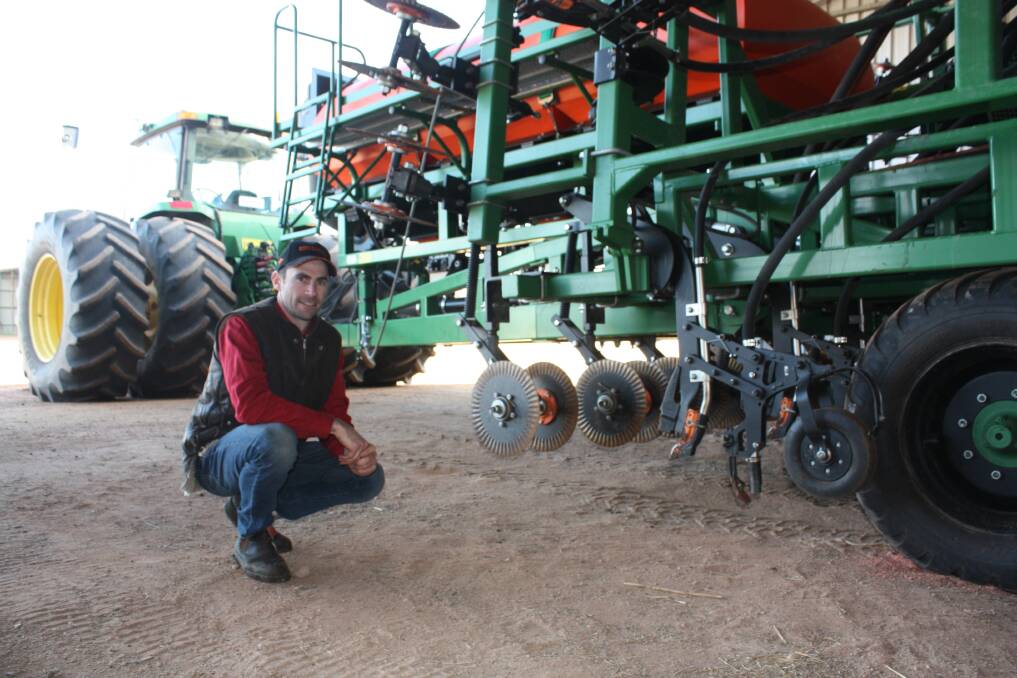  The University of WA 'Ridgefield' farm manager Steve Wainewright checks a new Ausplow DBS trial precision seeder which is used for crop establishment in partnership with Jandakot manufacturer Ausplow Farming Systems. "This is another example of how we are building synergies within the industry and we will work with Ausplow in future trial work," Steve said. "At this stage it's all about assessing
