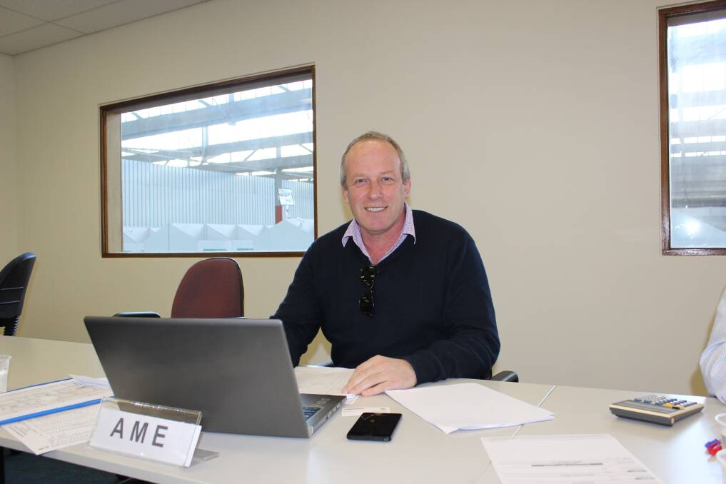 Australian Merino Exports managing director Chris Kelly in the Western Wool Centre auction room last week. Some brokers believe the extra buyer in the auction room contributed to bidding competition for the limited supply of wool on offer and helped push prices to record highs.