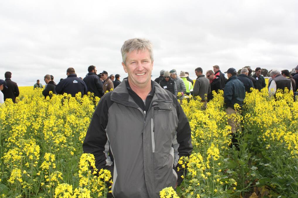 Precision Agronomics Australia director Quenten Knight checks out a crop of 43Y23 canola.