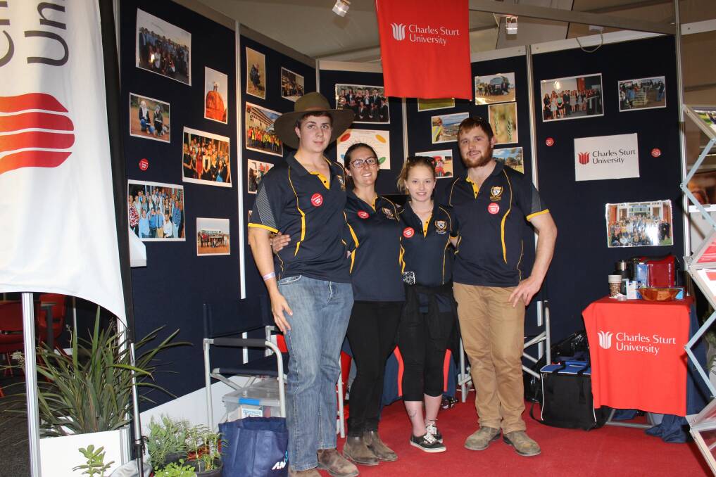  Second-year Charles Sturt University students at Muresk Institute, Jack Sawyer (left), Dalwallinu, Courtney Ciffolilli, Dardanup, and Jeremy Bryan (right), Moora, with supporter Nadia du Plessis, manning the stall at the Dowerin GWN7 Machinery Field Days last week to promote their Bachelor of Agriculture Business Management degree course.
