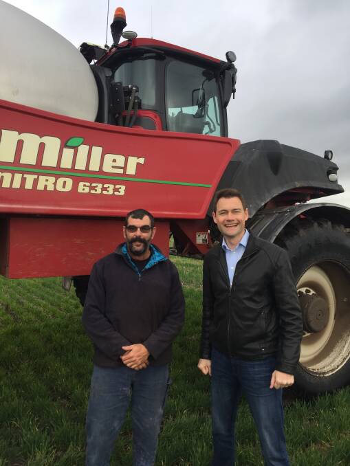 Farmhand Laurie Steer (left), who is the main operator of the Miller Nitro 6333 sprayer at Grant and Tracey Collins' Nyabing property, with Miller Sprayers global brand leader Jason Hardy, Canada, on his recent trip to WA visiting Miller customers.