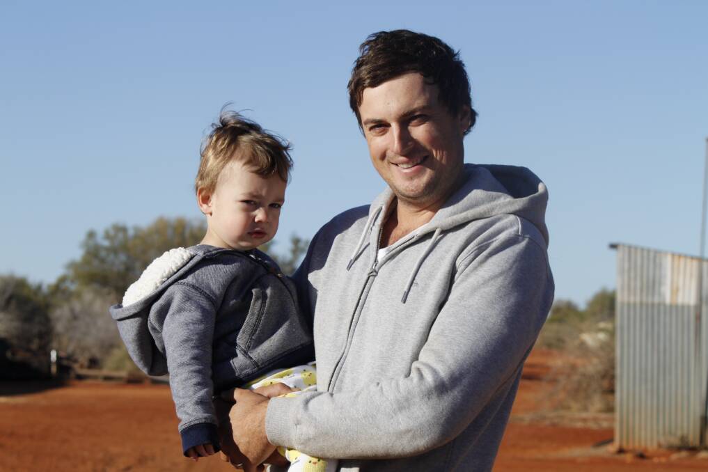 Carbla station manager Sam Fenny and his son Oliver (2).