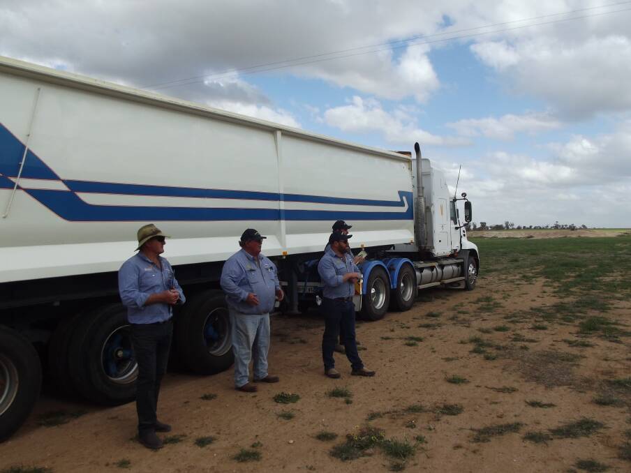The highest-priced item at the C Tricoli & Co clearing sale was a 2005 Mack 435L with a tri-axle tipper which went for $102,000, shown with the Primaries team and auctioneer, Jay Macdonald at the front. 