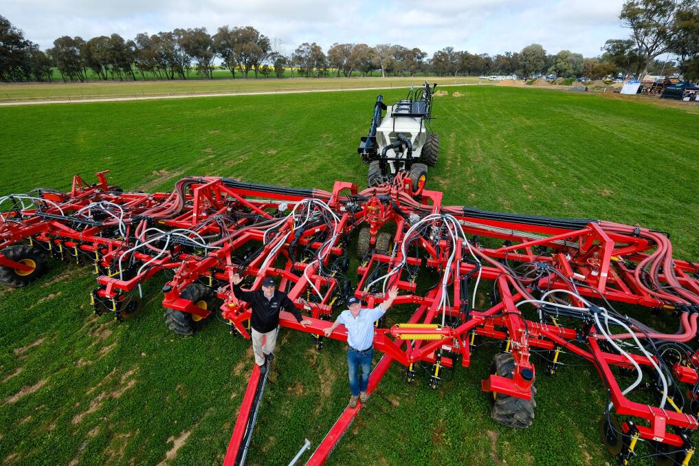 Bourgault Australia operations manager Denis Dorval (left) with Henty Machinery Field Days judge Mark Bowyer, on the award-winning Bourgault 3420 PHD Paralink Hoe Drill.