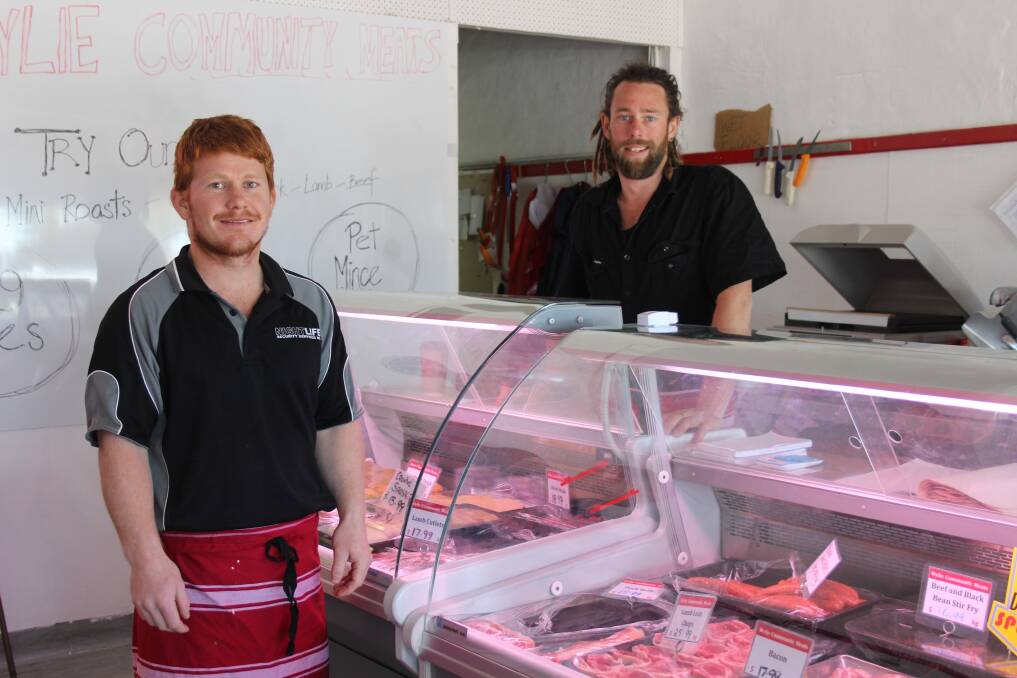 New Wylie Community Meats full-time butcher Matthew Munns (left) with director Brad Phillips in the store with a selection of meats for purchase.