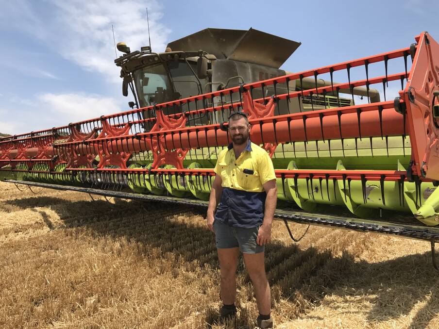 Nick Panizza finishing up the last of his barley at Arthur River on Sunday, with the program sped up with a second header.