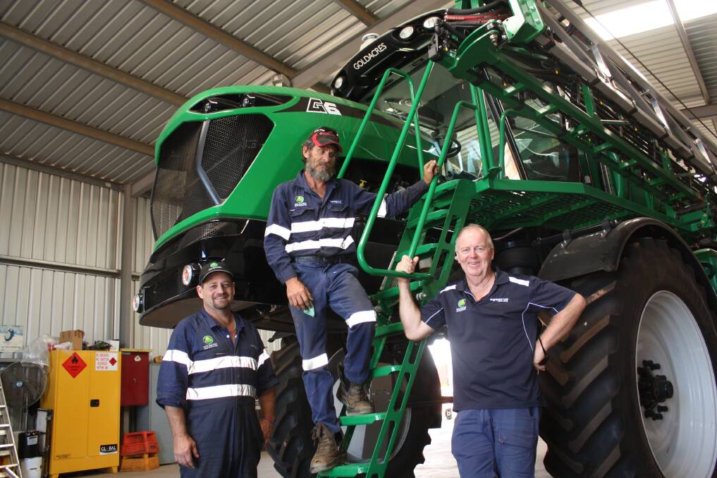  It's the right time to be servicing self-propelled boomsprayers, or in this case, completing a pre-delivery check of a new Goldacres G6 model. Torque snapped this shot last week at Goldacres dealer AgServe Goomalling as Graham Taylor (left), Toby Perrins and dealer principal Greg Baird stopped briefly to smile for the camera. Though in Toby's case it was more of a quizzical look at Greg. Maybe Gr