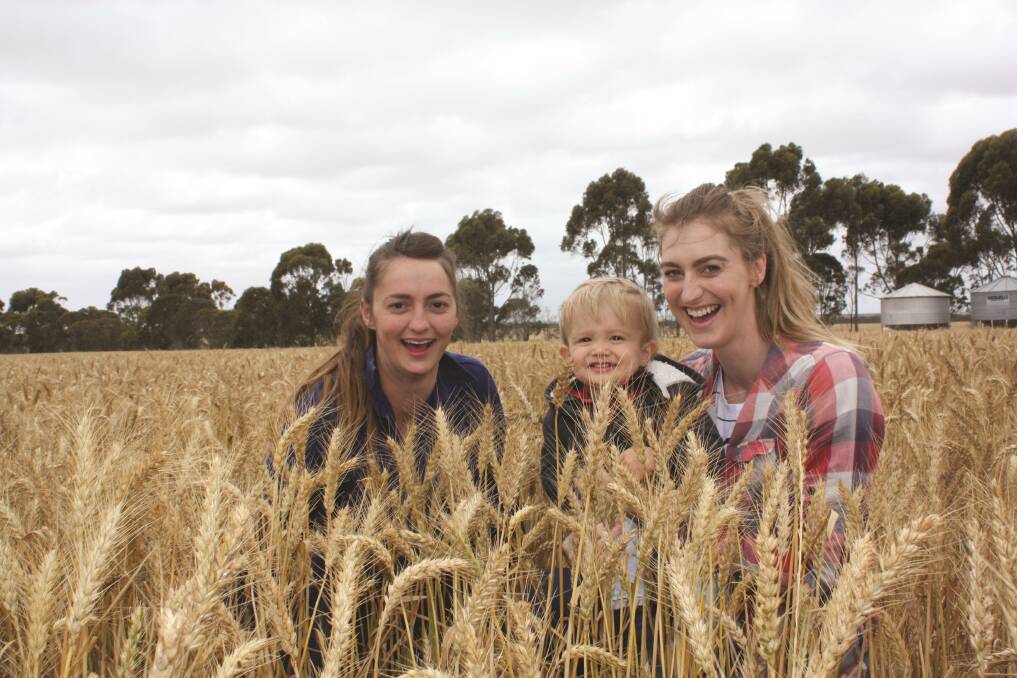 Growers in the Esperance region are on track for a record breaking harvest and have yielded the best results of all port zones across the grainbelt this season. Sisters Zoe (left) and Honni Mansell, with Honni's son Thomas were all smiles in early November as the family prepared to harvest this Mace crop at Beaumont.