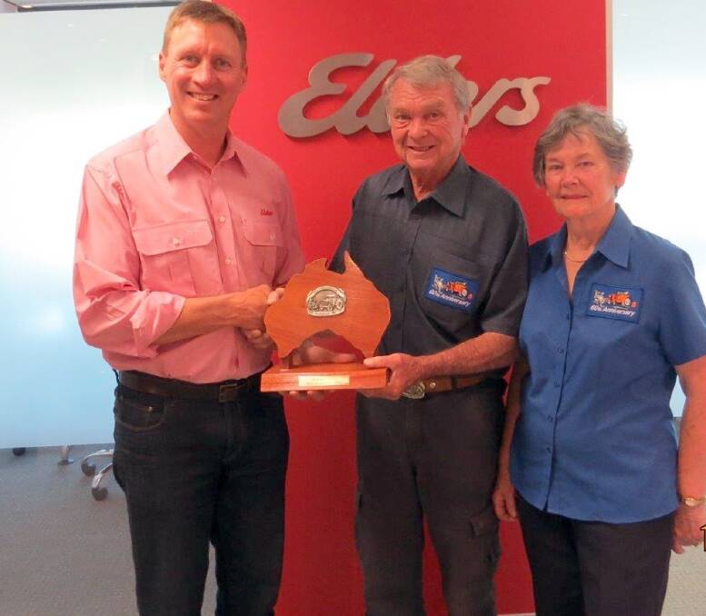 Elders west zone general manager James Cornish (left) receives a plaque from Ron and Kerry Bywaters, acknowledging the company's support of the Tail-End Charlie campaign and journey.