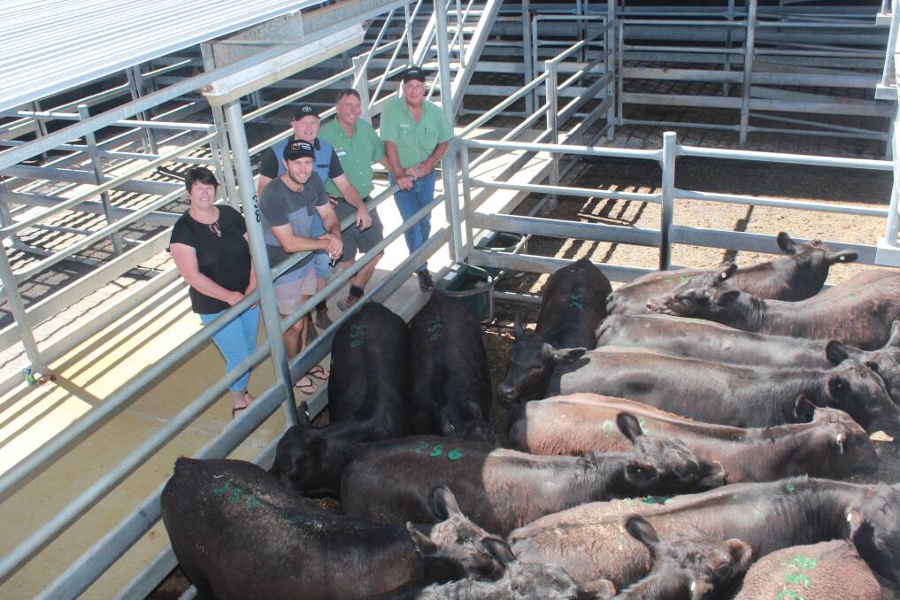Karen (left), Luke and Noel Bairstow, Arizona Farms, Lake Grace, with Landmark Lake Grace agent Gary Prater and Landmark southern livestock manager Bob Pumphrey and a pen of Arizona steers. The Bairstows offered close to 550 steers in last week's Landmark Special Angus Weaner Sale held at the Mt Barker Regional Saleyards and recorded a top of $1258 for a line of 16.